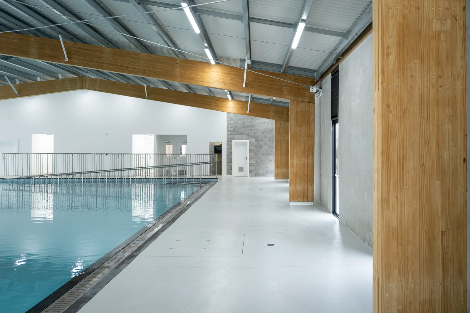 Pool lane and stainless balustrade along the concourse